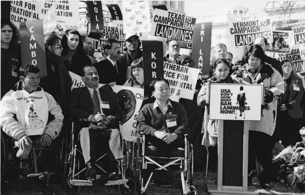 Landmine survivors and advocates at a “Ban Landmines Now” rally