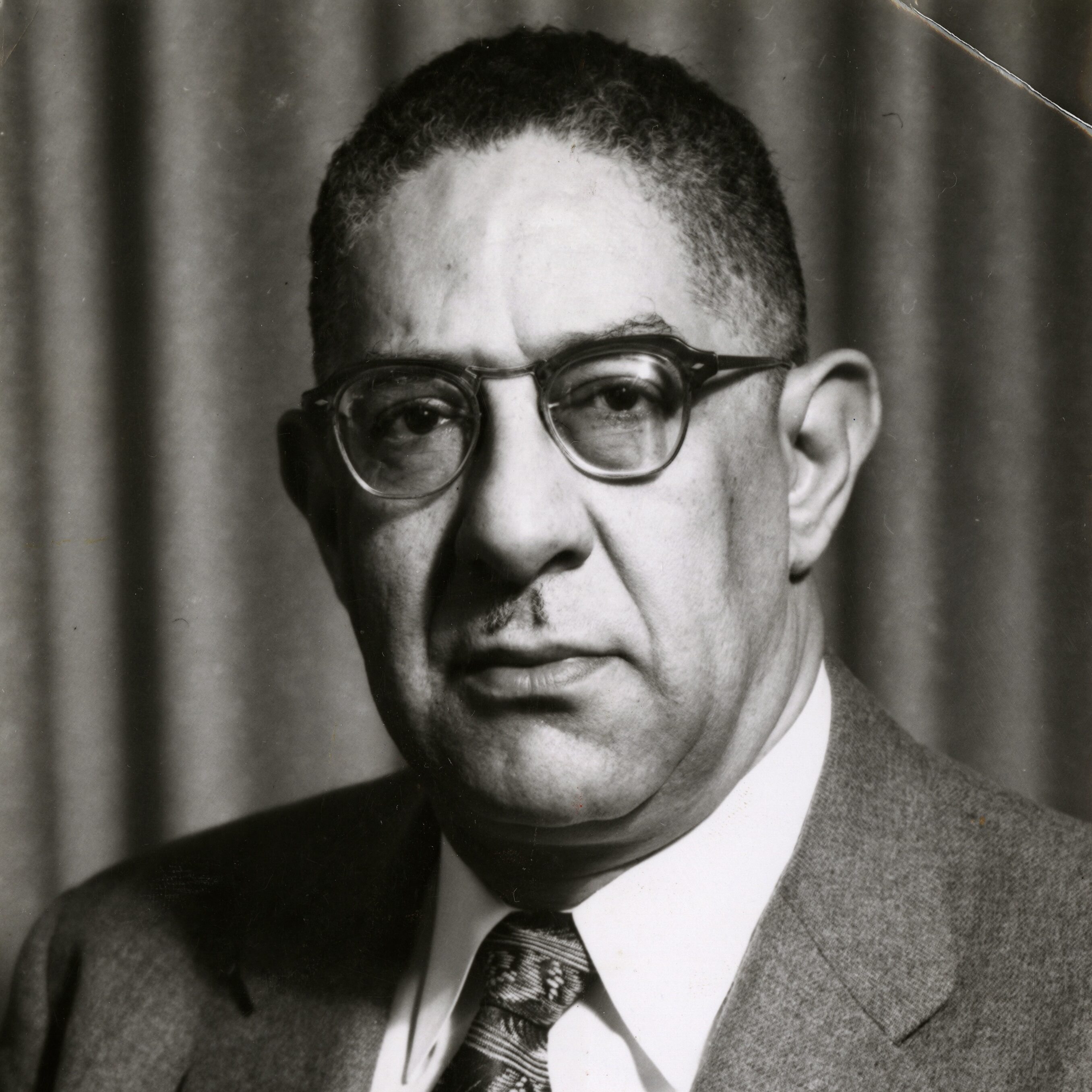 As for Charles Loeb's photos, there’s a portrait from 1958 that is in the public domain. 
It’s from the Cleveland Public Library, and when I was clearing the rights for Bombshell, they told me that photo had no restrictions. 

This is the credit line they asked us to use: "Cleveland Public Library/Photograph Collection".